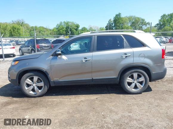 2012 Kia Sorento EX with VIN 5XYKUDA61CG244312, listed as a IAAI auction lot 42343888 with 164,520 mi miles and . Bid and sale history available at DreamBid. Image 14.