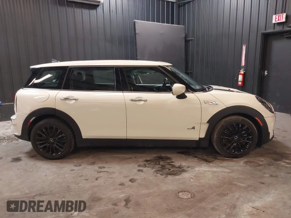 2023 MINI Clubman Cooper S with VIN WMWXJ1C02P2S77645, listed as a IAAI auction lot 41300674 with 34,302 mi miles. Bid and sale history available at carsss.com. Image 13.