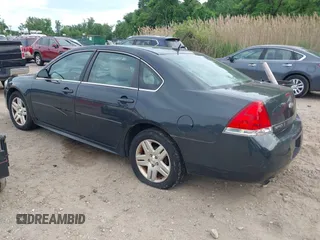 2014 Chevrolet Impala LT with VIN 2G1WB5E33E1180051, listed as a IAAI auction lot 42225939 with 162,161 mi miles and . Bid and sale history available at DreamBid. Image 3.