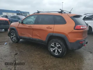 2014 Jeep Cherokee Trailhawk with VIN 1C4PJMBB4EW317799, listed as a Copart auction lot 46779095 with 95,832 mi miles and Clean Title. Bid and sale history available at carsss.com. Image 2.