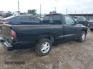 1998 Dodge Dakota SLT with VIN 1B7FL26X0WS720008, listed as a IAAI auction lot 42120683 with 194,922 mi miles and . Bid and sale history available at carsss.com. Image 4.