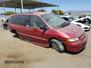 1998 Dodge Caravan z VIN 1B4GP5418WB631553, wystawiony jako Copart lot #65227034 z przebiegiem Nie podano mil oraz Szkoda całkowita • Salvage title. Historia ofert i sprzedaży dostępna na DreamBid. Obrazek 4.