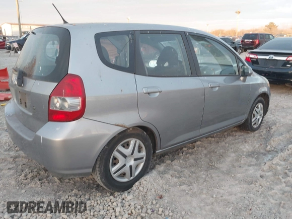 2007 Honda Fit with VIN JHMGD38417S043657, listed as a IAAI auction lot 41025258 with 147,034 mi miles. Bid and sale history available at carsss.com. Image 4.