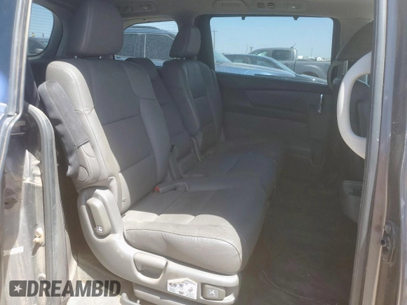 2015 Honda Odyssey Touring Elite z VIN 5FNRL5H97FB002739, wystawiony jako Copart lot #62060695 z przebiegiem 194 604 mil mil oraz Szkoda całkowita • Salvage title. Historia ofert i sprzedaży dostępna na DreamBid. Obrazek 11.
