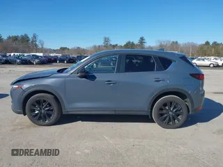 2021 Mazda CX-5 Touring with VIN JM3KFBCM0M0489644, listed as a IAAI auction lot 41756117 with 67,365 mi miles. Bid and sale history available at carsss.com. Image 14.