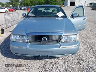 2005 Mercury Grand Marquis LS Premium z VIN 2MEFM75W15X621971, wystawiony jako IAAI lot #42130811 z przebiegiem 129 700 mil mil oraz . Historia ofert i sprzedaży dostępna na DreamBid. Obrazek 6.