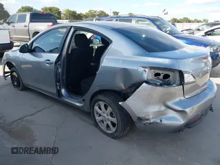 2010 Mazda 3 i SV with VIN JM1BL1SF4A1148543, listed as a IAAI auction lot 40110323 with 131,801 mi miles and . Bid and sale history available at DreamBid. Image 3.