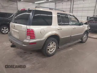 2003 Mercury Mountaineer Convenience z VIN 4M2ZU86K23ZJ06043, wystawiony jako IAAI lot #42215814 z przebiegiem 259 172 mil mil oraz . Historia ofert i sprzedaży dostępna na DreamBid. Obrazek 4.