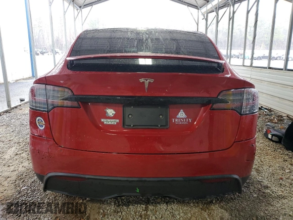 2023 Tesla Model X with VIN 7SAXCBE52PF365140, listed as a Copart auction lot 44564965 with 27,107 mi miles and Salvage Title. Bid and sale history available at DreamBid. Image 6.