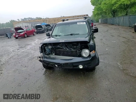 2014 Jeep Patriot Latitude with VIN 1C4NJPFA1ED651021, listed as a Copart auction lot 56947445 with 137,239 mi miles and Salvage title. Bid and sale history available at DreamBid. Image 15.