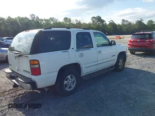 2003 Chevrolet Tahoe LS z VIN 1GNEC13Z83J195493, wystawiony jako IAAI lot #42472037 z przebiegiem 228 016 mil mil oraz . Historia ofert i sprzedaży dostępna na DreamBid. Obrazek 4.