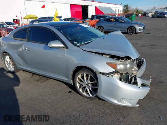 2005 Scion tC z VIN JTKDE177750019561, wystawiony jako IAAI lot #41045961 z przebiegiem Nie podano mil oraz . Historia ofert i sprzedaży dostępna na DreamBid. Obrazek 1.