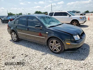 2004 Volkswagen Jetta GLS with VIN 3VWSE69M44M087341, listed as a Copart auction lot 59935515 with 116,139 mi miles and Salvage title. Bid and sale history available at DreamBid. Image 4.