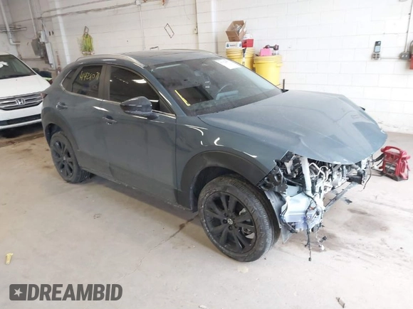 2024 Mazda CX-30 2.5 S Carbon Edition with VIN 3MVDMBCMXRM612697, listed as a IAAI auction lot 41428071 with 28,718 mi miles. Bid and sale history available at carsss.com. Image 1.
