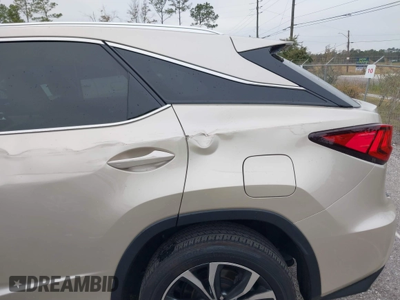 2018 Lexus RX with VIN 2T2ZZMCA9JC099803, listed as a IAAI auction lot 41052078 with 32,423 mi miles. Bid and sale history available at carsss.com. Image 6.