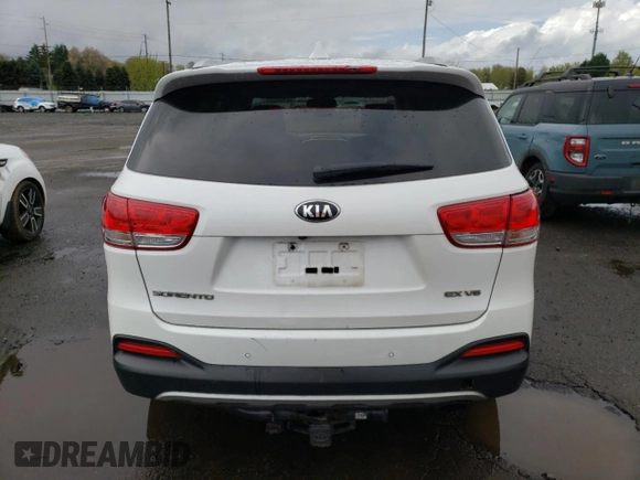 2016 Kia Sorento EX with VIN 5XYPHDA50GG005955, listed as a Copart auction lot 52306045 with 151,221 mi miles and Clean Title. Bid and sale history available at carsss.com. Image 6.