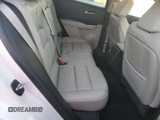 2020 Cadillac XT4 FWD Premium Luxury z VIN 1GYFZCR49LF118146, wystawiony jako Copart lot #82495614 z przebiegiem Nie podano mil oraz Nie do naprawy • Non repairable. Historia ofert i sprzedaży dostępna na DreamBid. Obrazek 11.