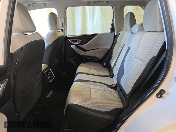 2023 Subaru Forester Premium with VIN JF2SKAEC1PH494927, listed as a IAAI auction lot 42566378 with 77,411 mi miles and . Bid and sale history available at DreamBid. Image 3.