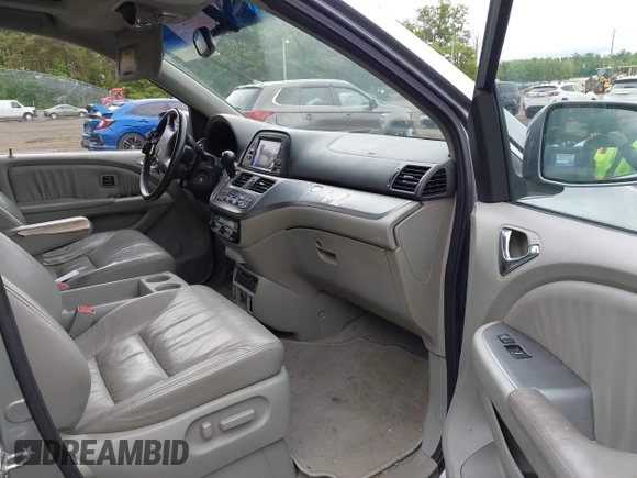 2008 Honda Odyssey Touring with VIN 5FNRL38908B066127, listed as a IAAI auction lot 42219444 with 188,868 mi miles and . Bid and sale history available at DreamBid. Image 5.