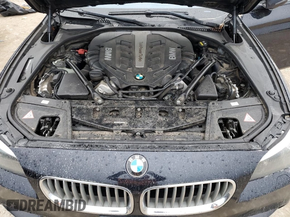 2015 BMW 5 Series 550i with VIN WBAKN9C50FD682415, listed as a Copart auction lot 83257714 with 129,605 mi miles and Clean title. Bid and sale history available at DreamBid. Image 11.