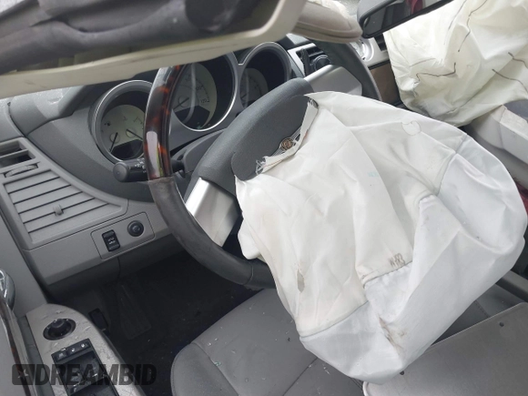 2008 Chrysler Sebring Limited with VIN 1C3LC65M48N289969, listed as a IAAI auction lot 41963154 with Not provided miles and . Bid and sale history available at DreamBid. Image 7.