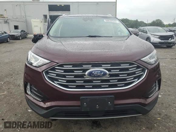 2019 Ford Edge SEL with VIN 2FMPK4J92KBB34891, listed as a Copart auction lot 60050945 with 104,942 mi miles and Salvage title. Bid and sale history available at DreamBid. Image 5.