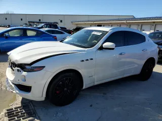 2019 Maserati Levante GranLusso with VIN ZN661XUL0KX313935, listed as a Copart auction lot 80213874 with 84,414 mi miles and Salvage Title. Bid and sale history available at carsss.com. Image 1.