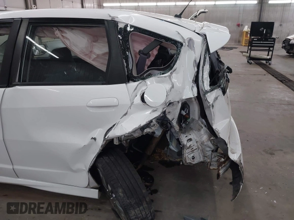 2012 Honda Fit Sport with VIN JHMGE8H50CC005506, listed as a IAAI auction lot 42017441 with 96,552 mi miles and . Bid and sale history available at DreamBid. Image 6.