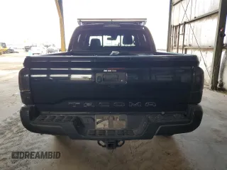 2020 Toyota Tacoma SR5 z VIN 5TFCZ5AN0LX229364, wystawiony jako Copart lot #55695505 z przebiegiem 69 908 mil mil oraz Szkoda całkowita • Salvage title. Historia ofert i sprzedaży dostępna na DreamBid. Obrazek 6.