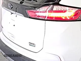 2019 Ford Edge SEL with VIN 2FMPK3J9XKBC37759, listed as a IAAI auction lot 42666643 with 103,812 mi miles and . Bid and sale history available at DreamBid. Image 21.