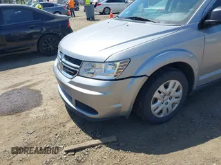 2016 Dodge Journey SE with VIN 3C4PDCAB1GT230387, listed as a IAAI auction lot 42106842 with 157,299 mi miles. Bid and sale history available at carsss.com. Image 12.