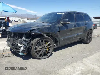 2018 Jeep Grand Cherokee Trackhawk with VIN 1C4RJFN90JC293820, listed as a Copart auction lot 63778505 with 87,682 mi miles and Salvage title. Bid and sale history available at DreamBid. Image 1.