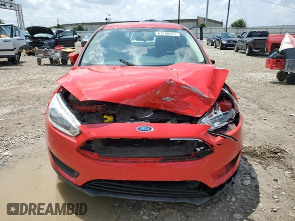 2017 Ford Focus SE z VIN 1FADP3F25HL339828, wystawiony jako Copart lot #61400925 z przebiegiem 69 806 mil mil oraz Szkoda całkowita • Salvage title. Historia ofert i sprzedaży dostępna na DreamBid. Obrazek 5.