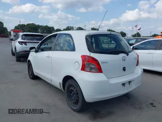 2008 Toyota Yaris with VIN JTDJT923085188881, listed as a IAAI auction lot 42157247 with 125,790 mi miles. Bid and sale history available at carsss.com. Image 3.