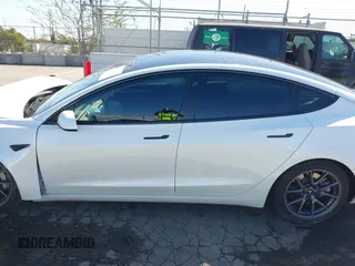 2023 Tesla Model 3 z VIN 5YJ3E1EA2PF514871, wystawiony jako IAAI lot #41703073 z przebiegiem 21 227 mil mil oraz . Historia ofert i sprzedaży dostępna na DreamBid. Obrazek 14.
