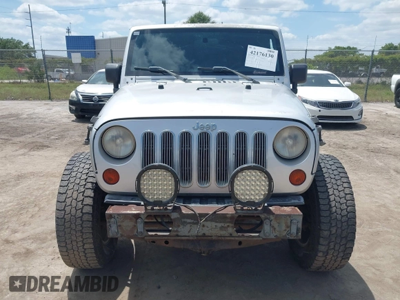 2009 Jeep Wrangler X with VIN 1J4FA24189L755392, listed as a IAAI auction lot 42176130 with 97,644 mi miles and . Bid and sale history available at DreamBid. Image 6.