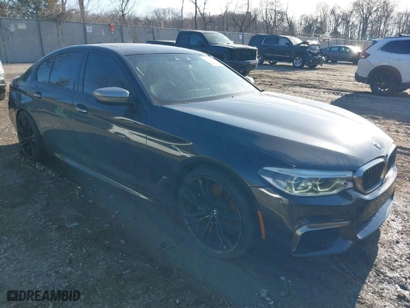 2018 BMW 5 Series M550i xDrive with VIN WBAJB9C55JB287431, listed as a IAAI auction lot 41433436 with 57,790 mi miles. Bid and sale history available at carsss.com. Image 1.