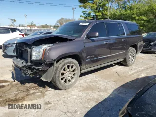 2015 GMC Yukon XL Denali with VIN 1GKS2JKJ8FR506392, listed as a Copart auction lot 73659994 with 103,271 mi miles and Salvage Title. Bid and sale history available at carsss.com. Image 1.