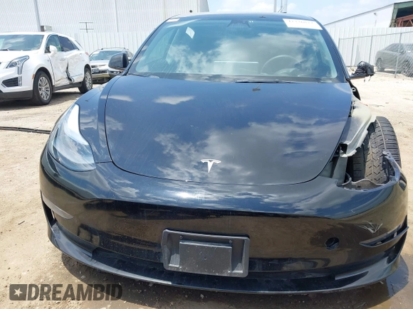 2023 Tesla Model 3 with VIN 5YJ3E1EA8PF454210, listed as a IAAI auction lot 42326822 with 43,200 mi miles and . Bid and sale history available at DreamBid. Image 13.
