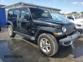 2020 Jeep Wrangler Unlimited Sahara Altitude with VIN 1C4HJXEGXLW292367, listed as a Copart auction lot 88130035 with 52,838 mi miles and Salvage title. Bid and sale history available at DreamBid. Image 4.