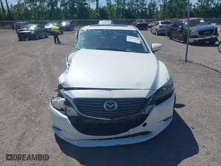 2016 Mazda Mazda6 i Grand Touring with VIN JM1GJ1W55G1443186, listed as a IAAI auction lot 42063716 with 114,263 mi miles. Bid and sale history available at carsss.com. Image 12.