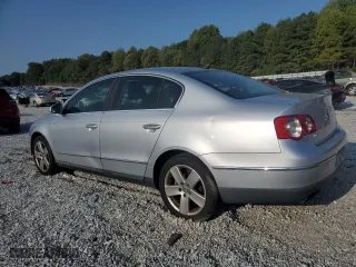 2009 Volkswagen Passat Sedan Komfort with VIN WVWJK73CX9P009421, listed as a Copart auction lot 70830104 with 224,356 mi miles and Salvage Title. Bid and sale history available at carsss.com. Image 2.