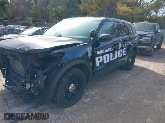 2020 Ford Police Interceptor Utility z VIN 1FM5K8AB2LGC51317, wystawiony jako IAAI lot #41755681 z przebiegiem 102 945 mil mil oraz . Historia ofert i sprzedaży dostępna na DreamBid. Obrazek 19.