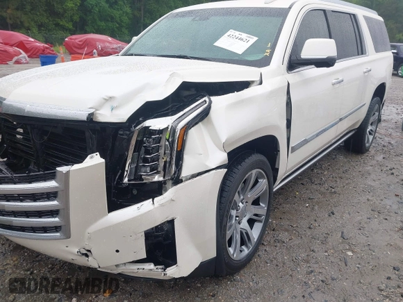 2015 Cadillac Escalade ESV Premium z VIN 1GYS4TKJ6FR708255, wystawiony jako IAAI lot #42244621 z przebiegiem 31 407 mil mil oraz . Historia ofert i sprzedaży dostępna na DreamBid. Obrazek 19.