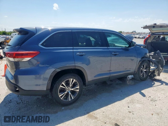 2019 Toyota Highlander LE z VIN 5TDZZRFH0KS324788, wystawiony jako Copart lot #56583055 z przebiegiem 167 001 mil mil oraz Szkoda całkowita • Salvage title. Historia ofert i sprzedaży dostępna na DreamBid. Obrazek 3.