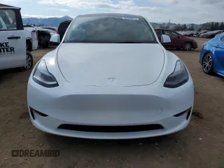 2025 Tesla Model Y Long Range with VIN 7SAYGDED6SF271931, listed as a Copart auction lot 43376015 with 261 mi miles and Salvage Title. Bid and sale history available at DreamBid. Image 5.