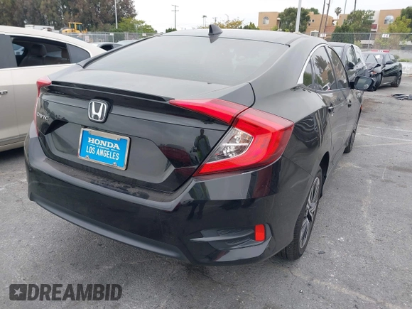 2016 Honda Civic Sedan EX-T with VIN 2HGFC1F34GH645220, listed as a IAAI auction lot 42043630 with 55,301 mi miles. Bid and sale history available at carsss.com. Image 4.