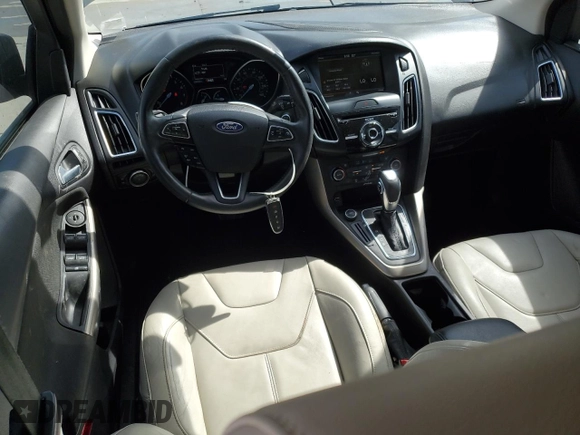 2015 Ford Focus Titanium с VIN 1FADP3J2XFL200668, выставлен на аукционе Copart как лот 54010865 с пробегом 138 459 миль миль и Списание • Salvage title. История ставок и продаж доступна на DreamBid. Изображение 8.