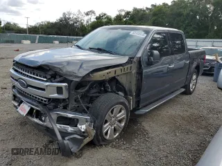 2018 Ford F-150 XL with VIN 1FTEW1CP0JFE07737, listed as a Copart auction lot 63108535 with 107,744 mi miles and Salvage title. Bid and sale history available at DreamBid. Image 1.