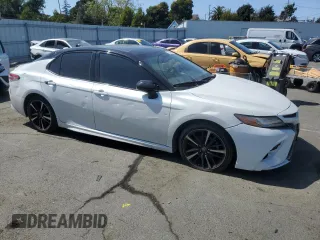 2019 Toyota Camry XSE with VIN 4T1B61HK4KU291189, listed as a Copart auction lot 52431035 with 194,186 mi miles and Salvage Title. Bid and sale history available at carsss.com. Image 4.